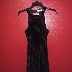Black dress, with little small circles of glitter